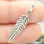 Small Feather Charm in Antique Silver Pewter