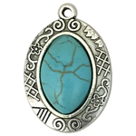 Silver Oval Turquoise Pendant with Aztec Style Bezel in Pewter